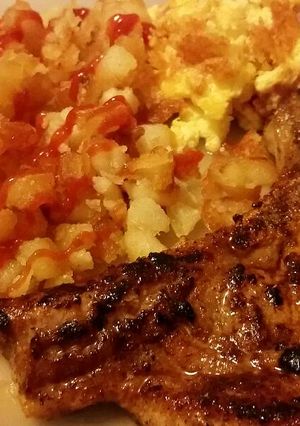 A picture of Porkchop breakfast for dinner.