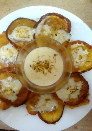 A picture of Malpua with rabdi(sweet pancake with sweet cream)EID MUBARAK 😊.