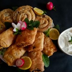 A picture of Lebanese meat pastry /pie _meat in dough_.