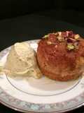 Warm honey cup pudding with pistachio frozen yoghurt