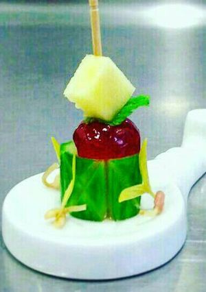 A picture of Honey glazed cucumber skewer.