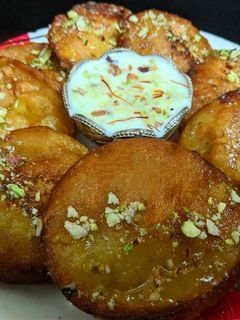 मालपुआ रबडी (malpua rabdi recipe in marathi) रेसिपी चे मुख्य फोटो