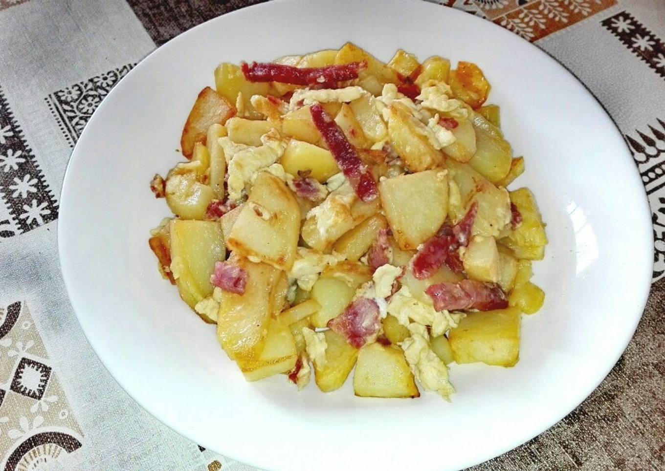 Revuelto individual de patatas y jamón serrano