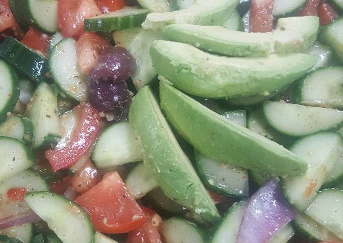 Greek tomato and cucumber salad with avocados