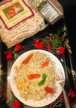 A picture of Linguine white sauce pasta.