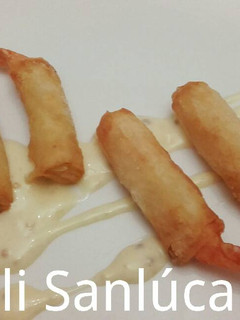 Una foto de Langostinos crujientes con salsa miel mostaza