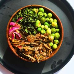 A picture of Fermented Oil Bean Salad with Cow Skin and Garden Eggs.