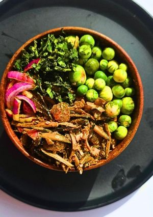 A picture of Fermented Oil Bean Salad with Cow Skin and Garden Eggs.