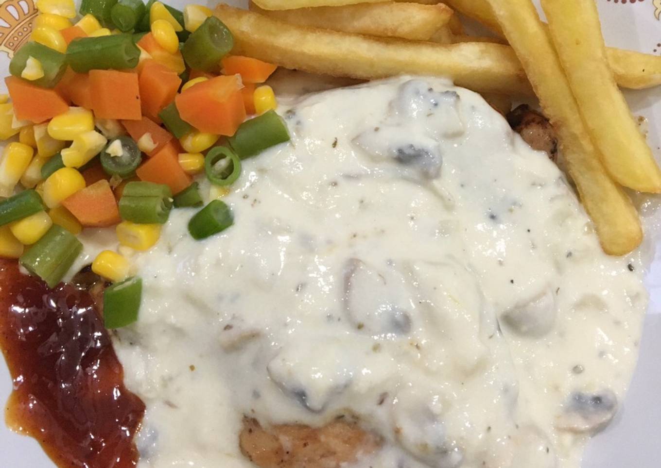 Grilled chicken steak with creamy mushroom sauce