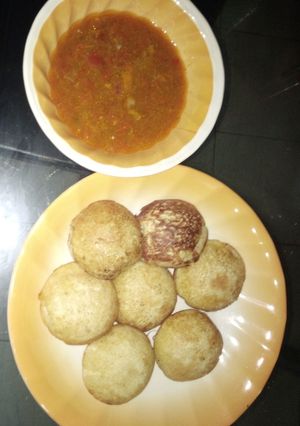 A picture of Semolina masa with chicken pepper soup.