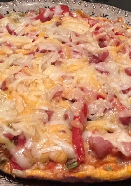 Una foto de Mini pizza con base de aguacate y plátano