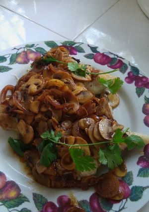 Una foto de Filetes de pescado con champiñones