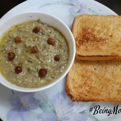 A picture of Brown Green  Chickpeas Hummus.