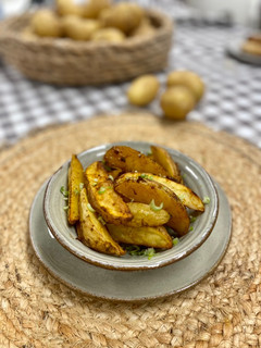 Una foto de Patatas gajo especiadas al horno