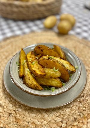Una foto de Patatas gajo especiadas al horno