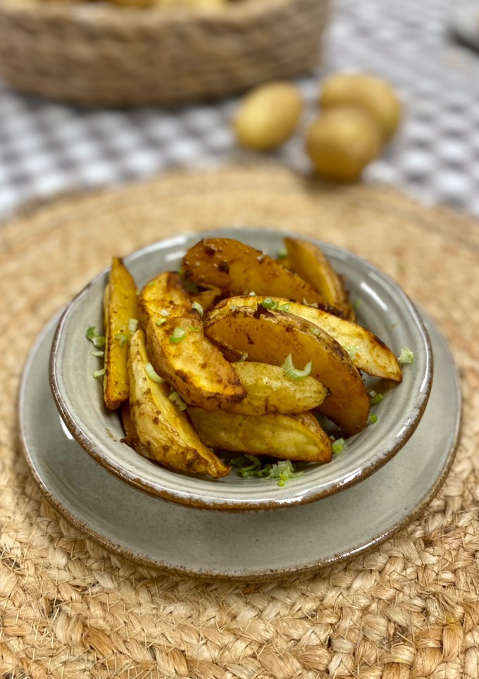 Una foto de Patatas gajo especiadas al horno