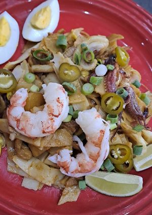 A picture of Squid and Chicken stir-fry.
