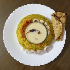 Vegetable khichadi with kadhi A picture of Vegetable khichadi with kadhi.