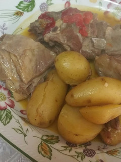 Una foto de Caldereta de Cabrito con patatas