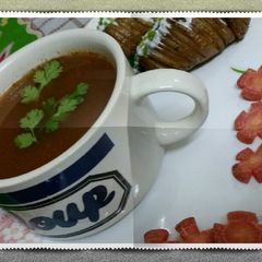 A picture of Healthy carrot soup with hasselback potatoes.