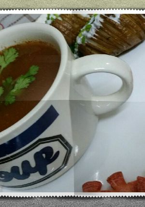 A picture of Healthy carrot soup with hasselback potatoes.