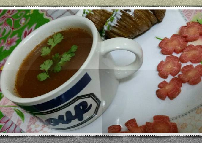 Healthy carrot soup with hasselback potatoes