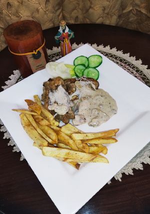 A picture of Grilled Chicken With White Mushroom Sauce🍄.
