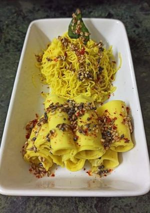 A picture of Khandvi and Khandvi Sev.