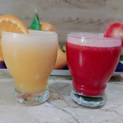 A picture of Fresh Orange 🍊 and carrot 🥕 juice.