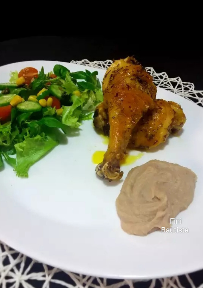 Una foto de Muslos de pollo al horno con puré de castañas