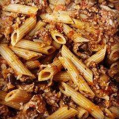 A picture of Penne Pasta with Meat Sauce.
