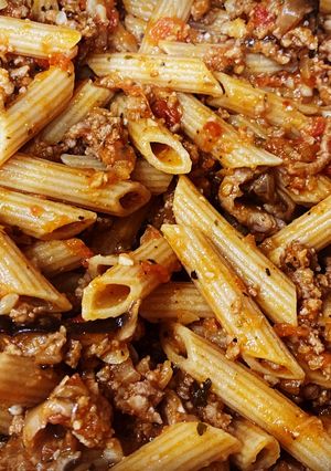 A picture of Penne Pasta with Meat Sauce.