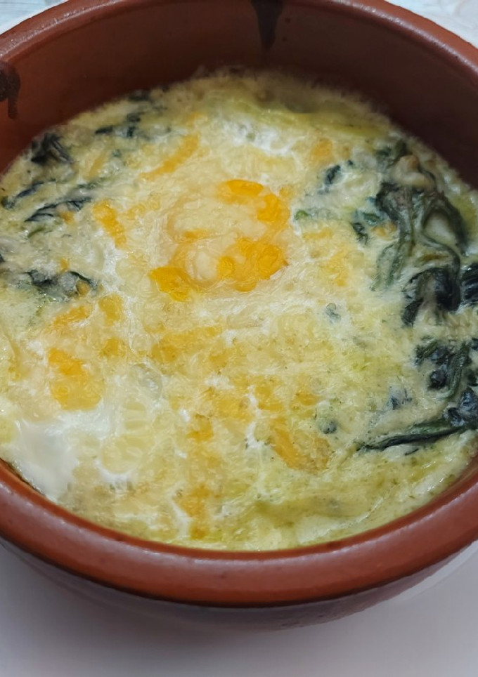 Una foto de Espinacas con salsa de queso de cabra