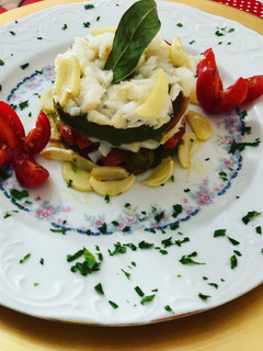 Una foto de Timbal de bacalao confitado con verduras