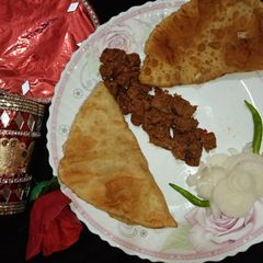 A picture of Beef tikka boti kabab in pateela.