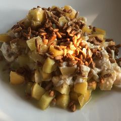 A picture of Baked Apples with Goat Cheese, Honey, and Mint.