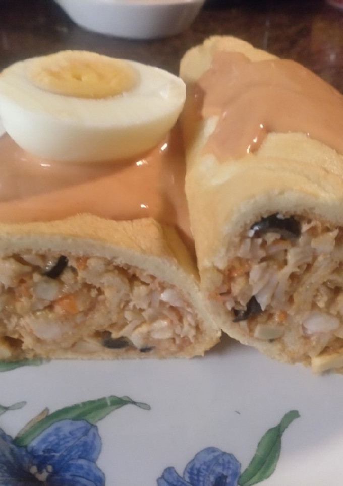 Una foto de Enrollado relleno de marisco