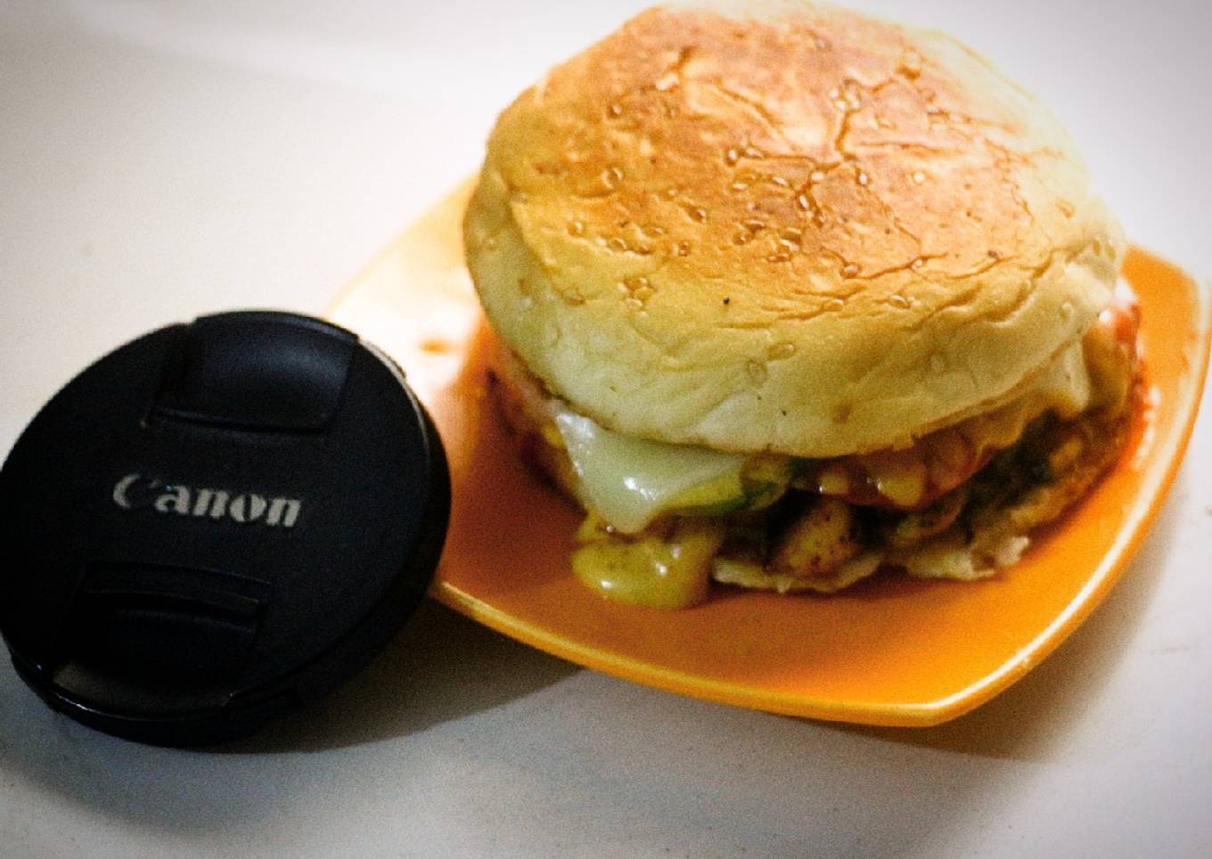 Cheezy grill burgers with homemade orange sauce (tikka sauce)