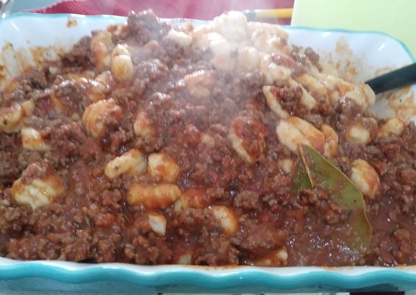 Ñoquis de papas con bolognesa