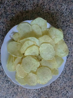 A picture of Homemade Potato Chips with Curry or Salt and Vinegar.