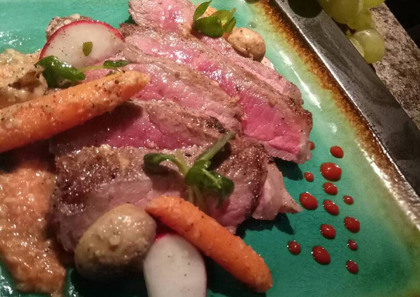 Steak steak with seasonal micro salad and wine sauce