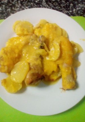 Foto principal de Horneado de jamoncitos de pollo con patatas a la naranja
