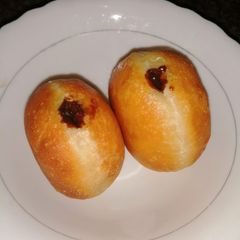 A picture of Filled doughnut 🍩.