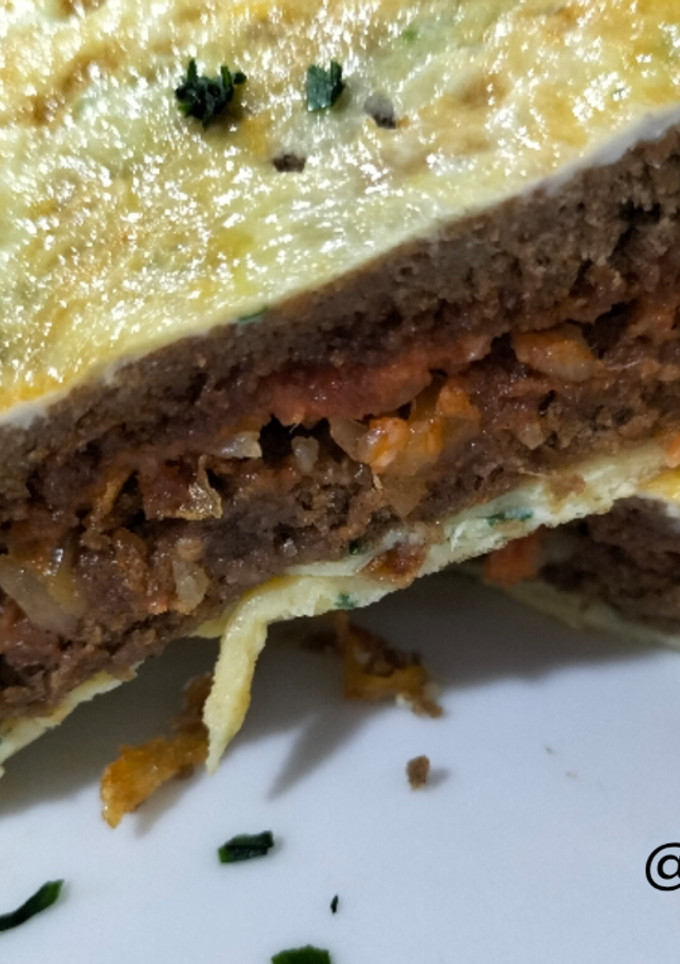 Una foto de Sándwich de centeno de sobrasada y queso envuelto en tortilla