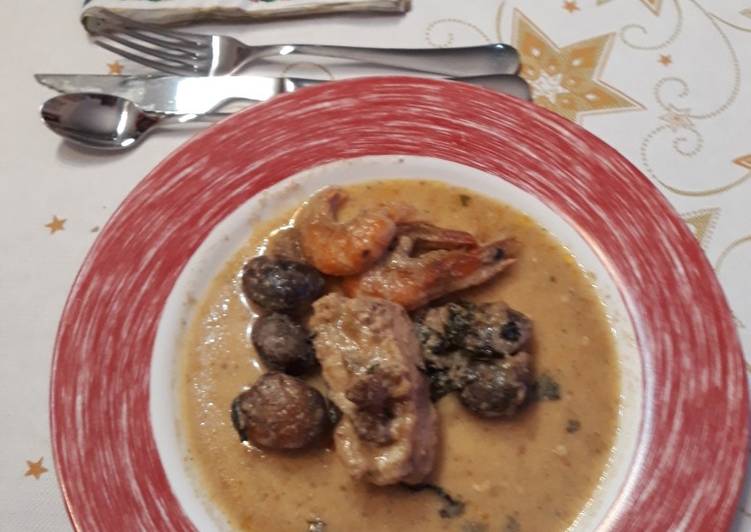 Rape con langostinos y almejas al cava