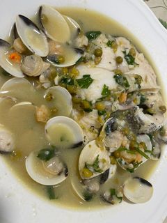 Una foto de Merluza en salsa verde