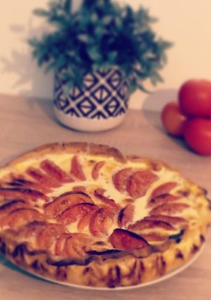 Une photo de Tarte tomate/mozzarella basilic