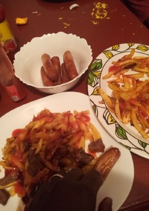 A picture of Chips and sausage.
