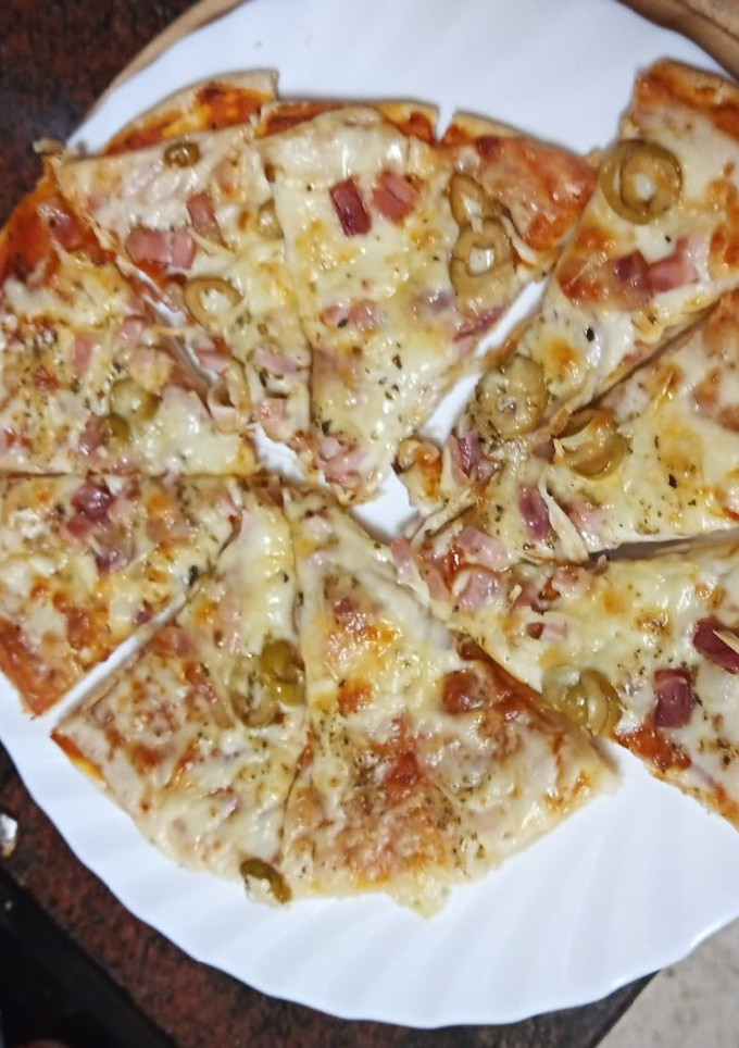 Una foto de Pizza clásica a mi estilo
