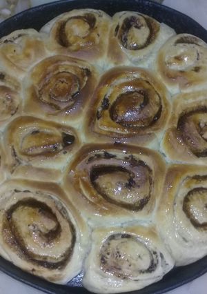 Una foto de Rollitos de azúcar negra y chocolate, súper esponjosos!
